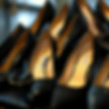 Different styles of black pumps arranged aesthetically
