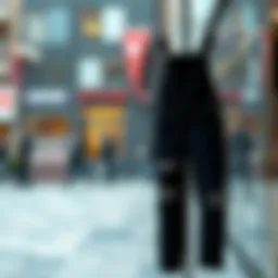 Chic black ripped overalls displayed in a stylish urban environment