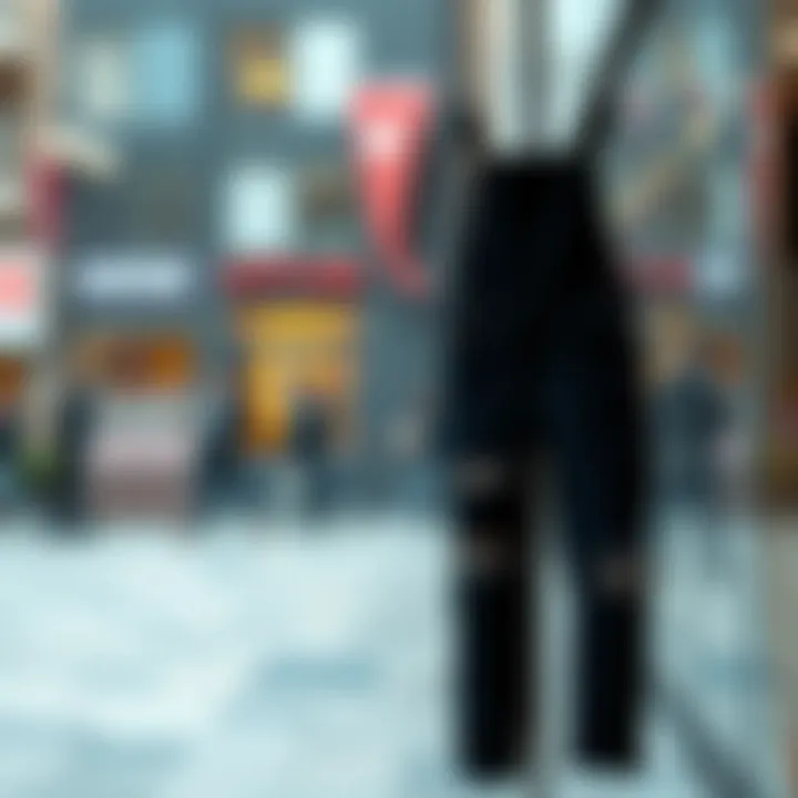 Chic black ripped overalls displayed in a stylish urban environment