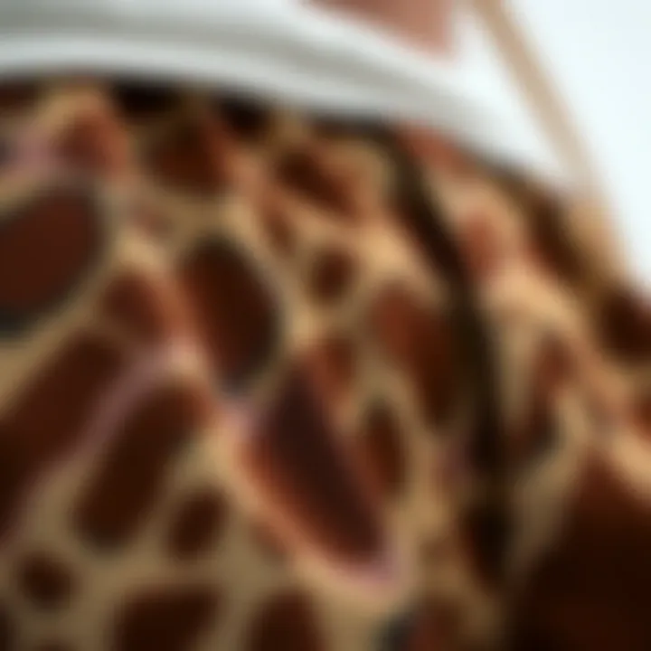 A close-up of the intricate fabric pattern of brown cow shorts