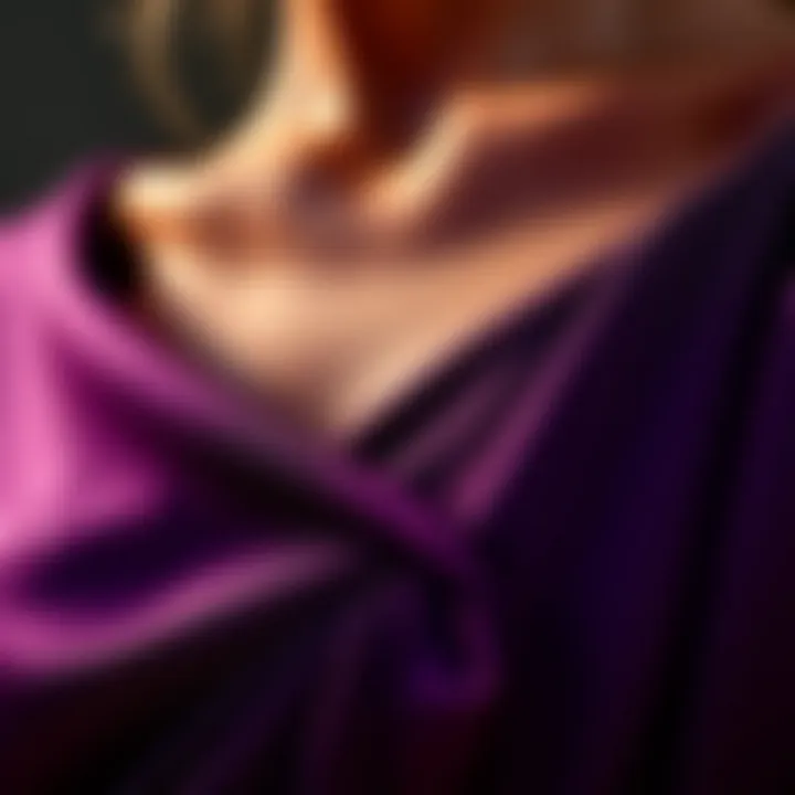 Close-up of boat neckline detailing on a luxurious fabric