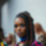 A close-up of beautifully styled goddess locs showcasing different colors and textures