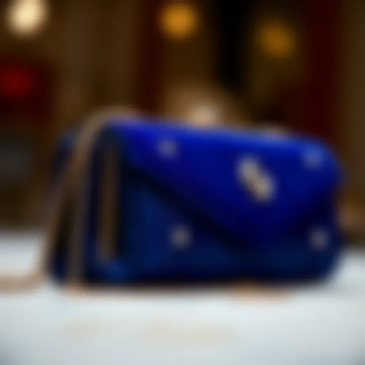 Close-up of craftsmanship in a royal blue evening bag