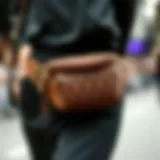 Intricate Design of a Stylish Waist Strap Bag A close-up of a stylish waist strap bag showcasing its intricate design.