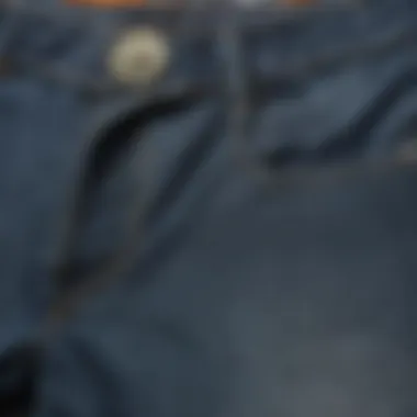 Close-up of the fabric texture of wide leg denim shorts.