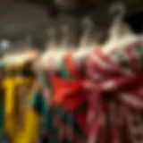 A collection of vibrant belly dance wraps showcasing various fabrics and patterns.