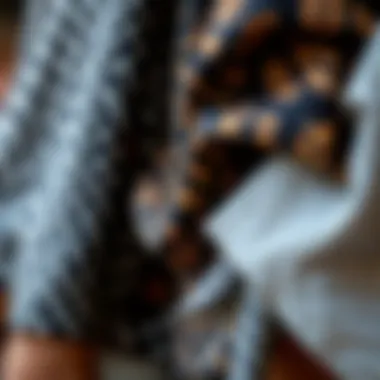 Close-up of fabrics used in creating two-piece mini skirt sets, showcasing textures and patterns.