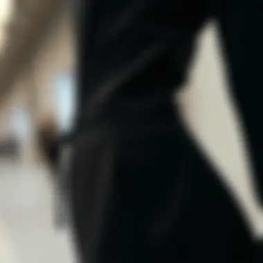 Close-up of fabric details of a black jumpsuit